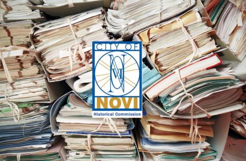 Image of papers and files with Novi Historical Commission Logo on top