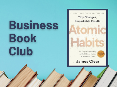 Blue background with books at the bottom edge. Text reads Business Book Club. Image of the book Atomic Habits.