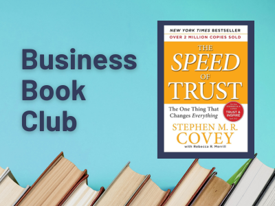 Graphic with a blue background and books along the bottom edge. Text on the left reads “Business Book Club.” On the right is the white and yellow cover of The Speed of Trust: The One Thing That Changes Everything by Stephen M.R. Covey.